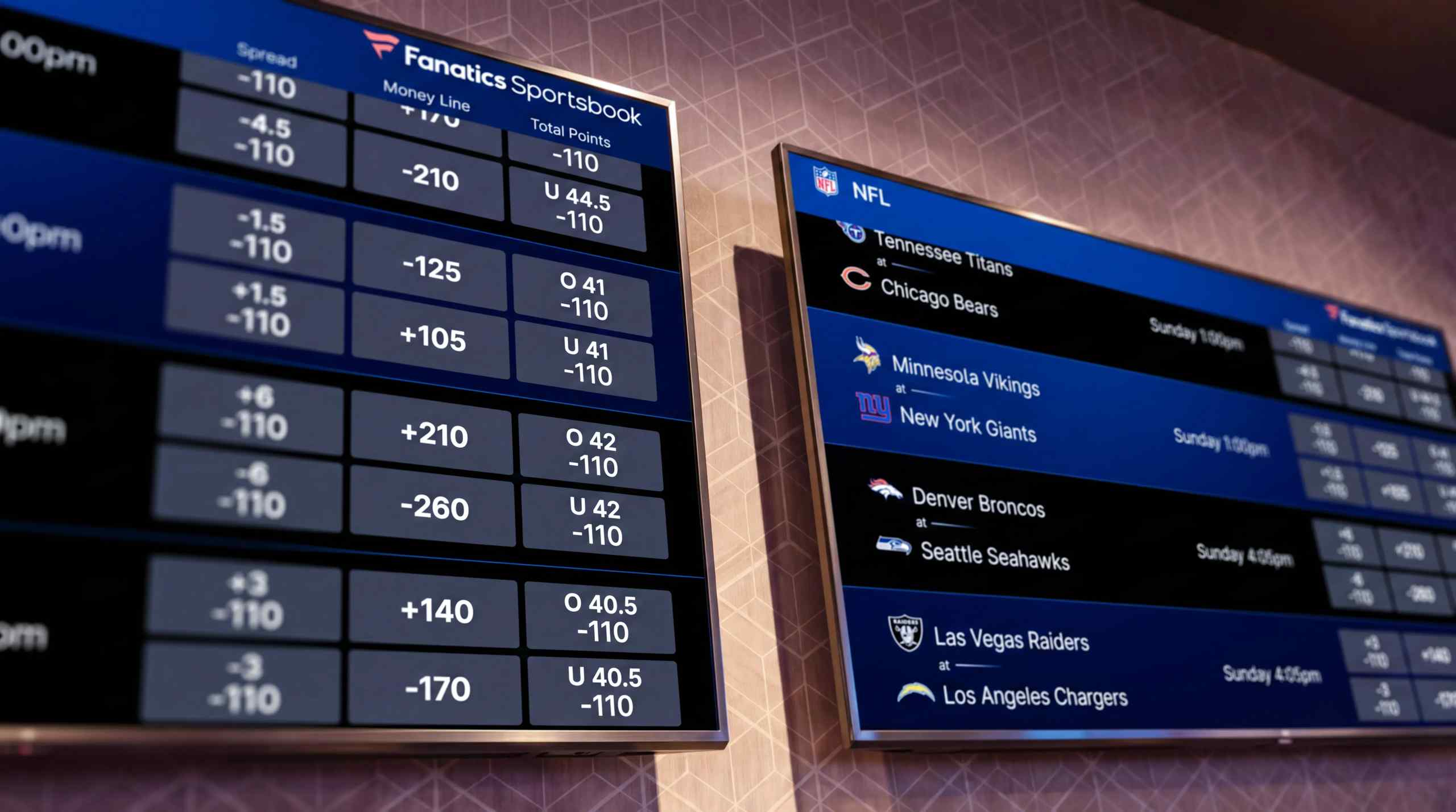 Fanatics Sportsbook odds displayed on two monitors.